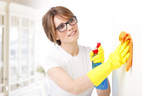 Carpet cleaner inspecting equipment before starting work