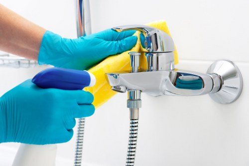 Cleaner managing hoses and reducing trip hazards during carpet cleaning